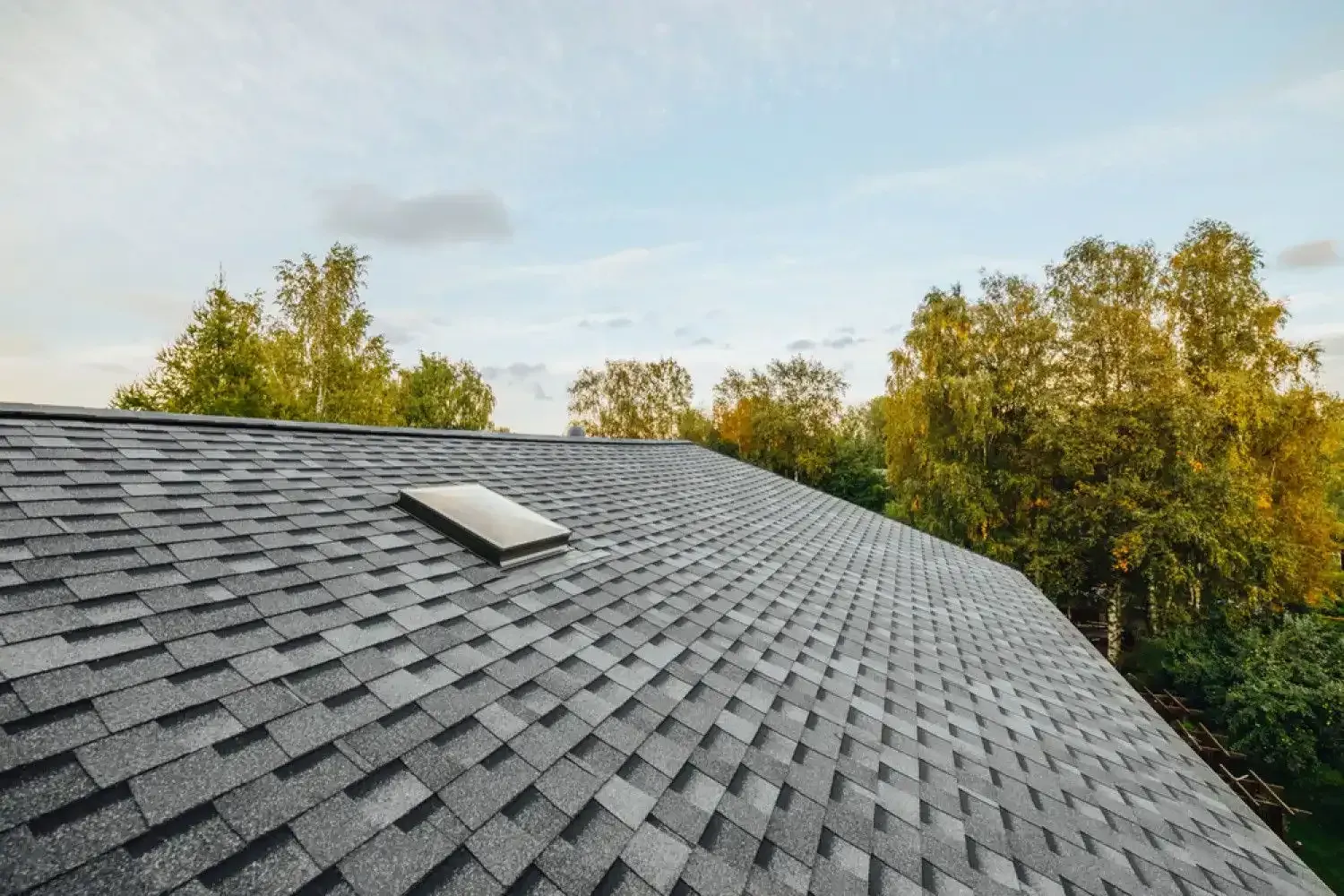 Roofing professionals installing a new roof